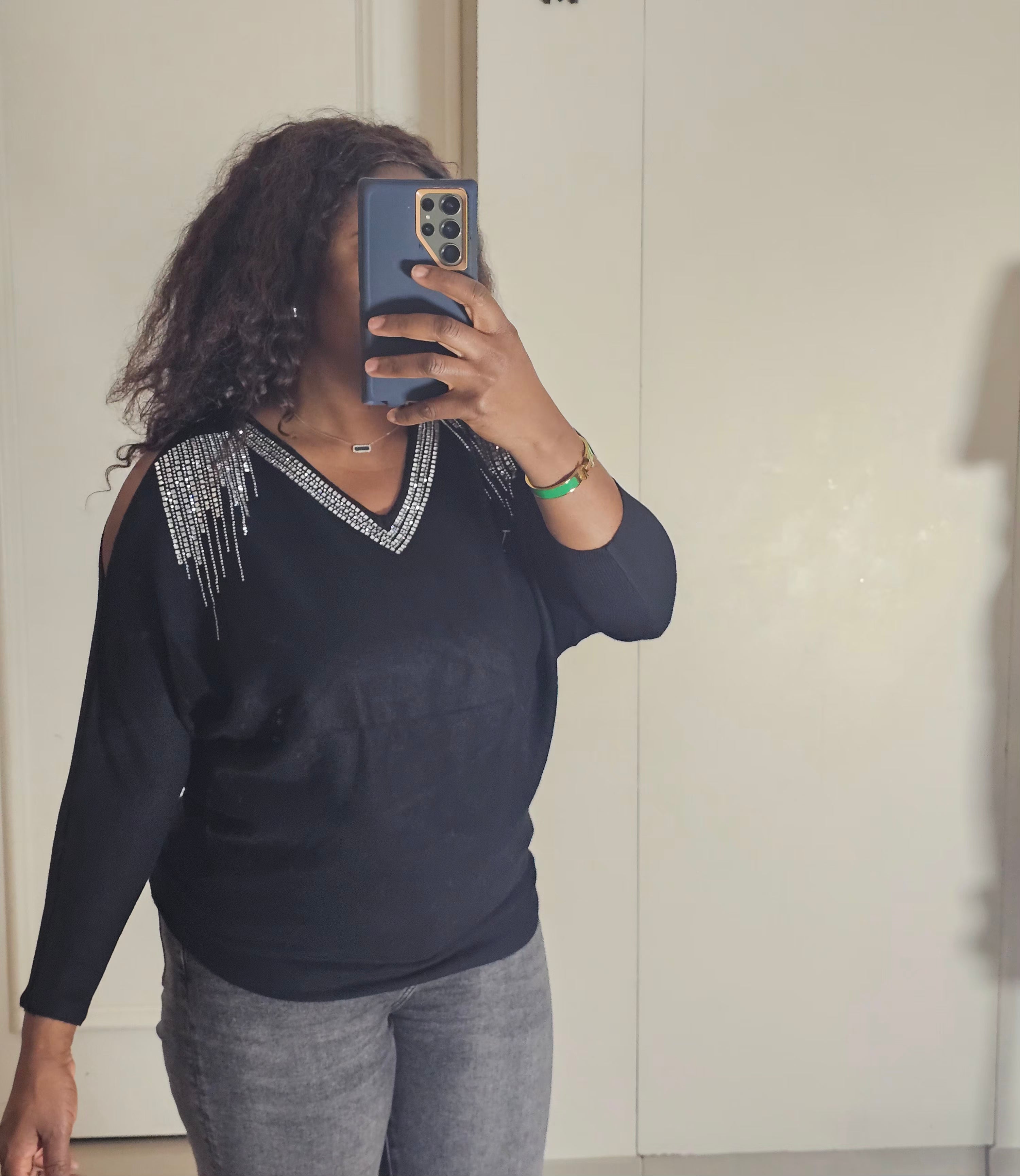 Pull col v épaule ouverte