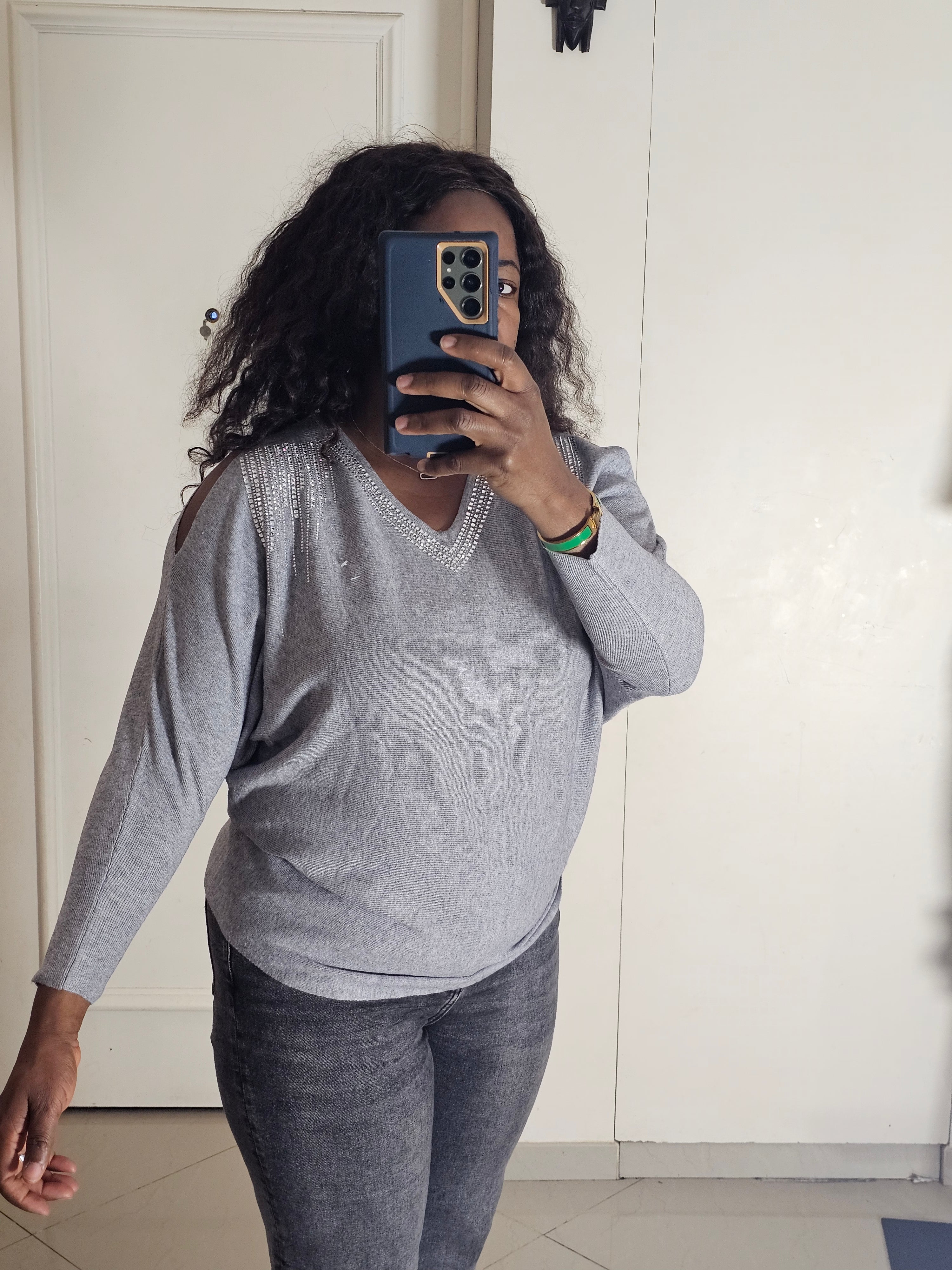 Pull col v épaule ouverte