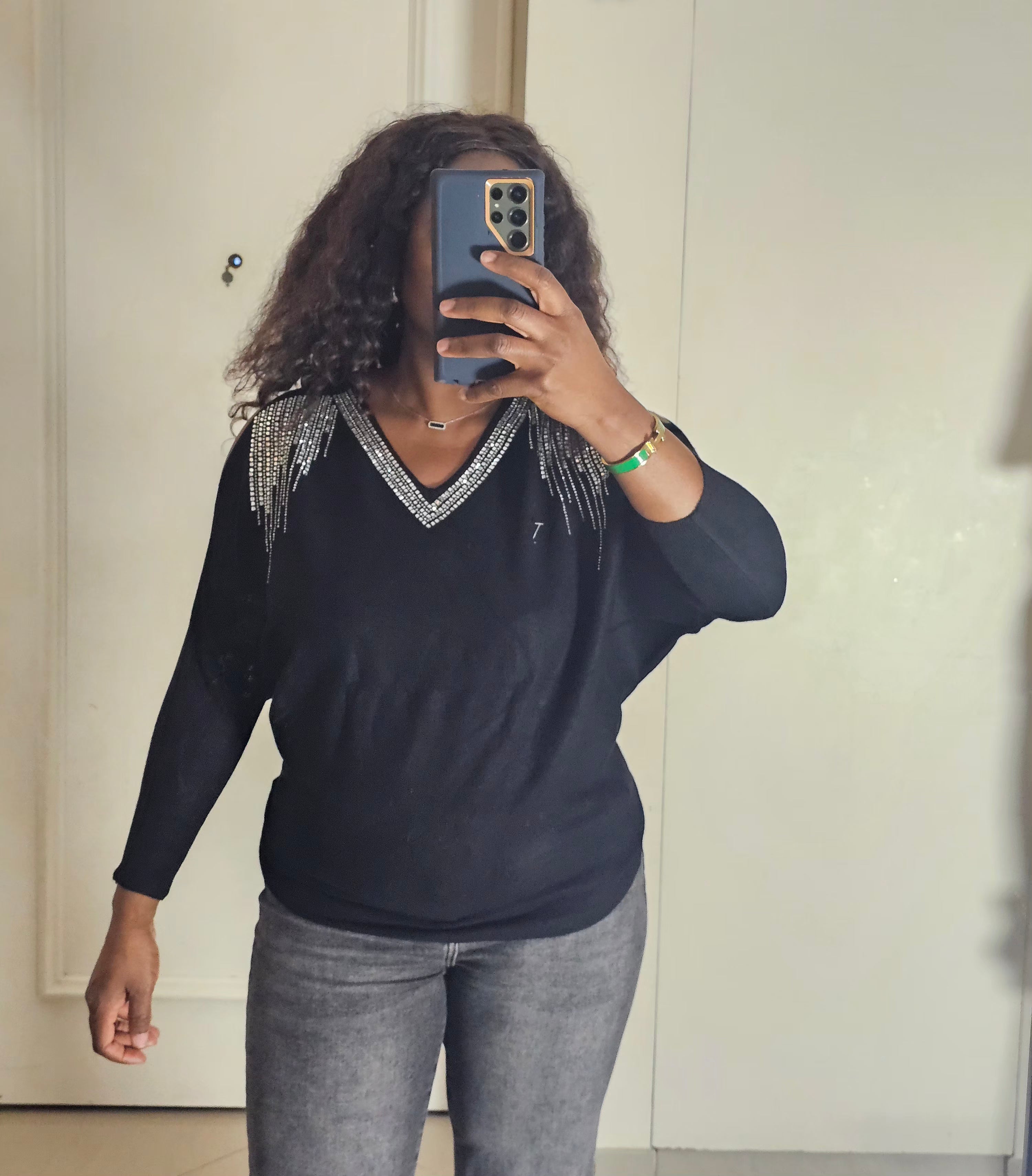 Pull col v épaule ouverte