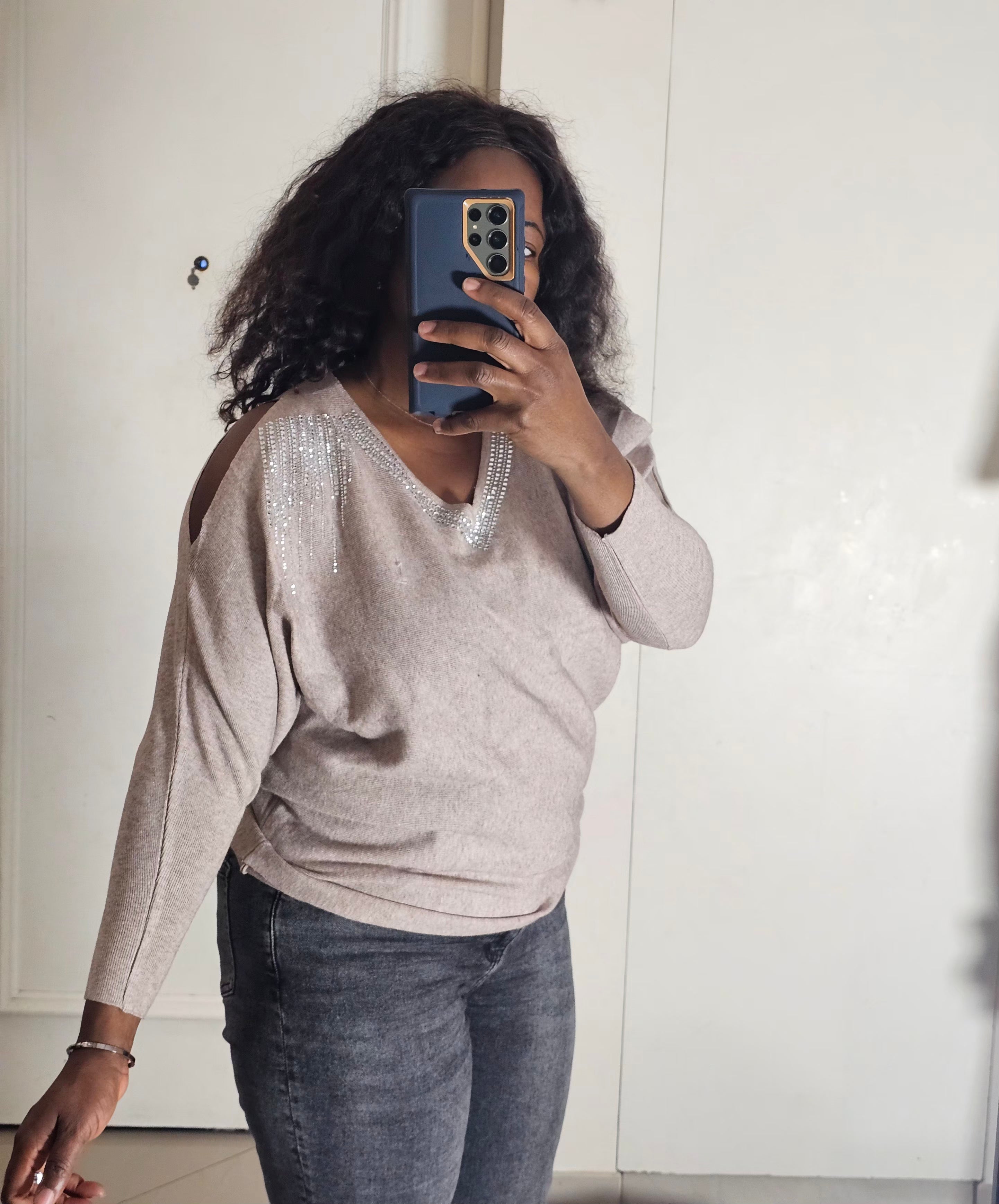 Pull col v épaule ouverte